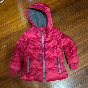 Coat in excellent condition. seldom used. cherry color, brand Calvin Klein.